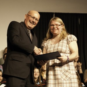 Bethany president Howie Wall congratulates Cherie Bright, winner of the 1st-year academic award 