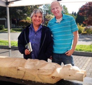 Don (r) with friend and Aboriginal artist Isadore Charters carving a healing totem pole.