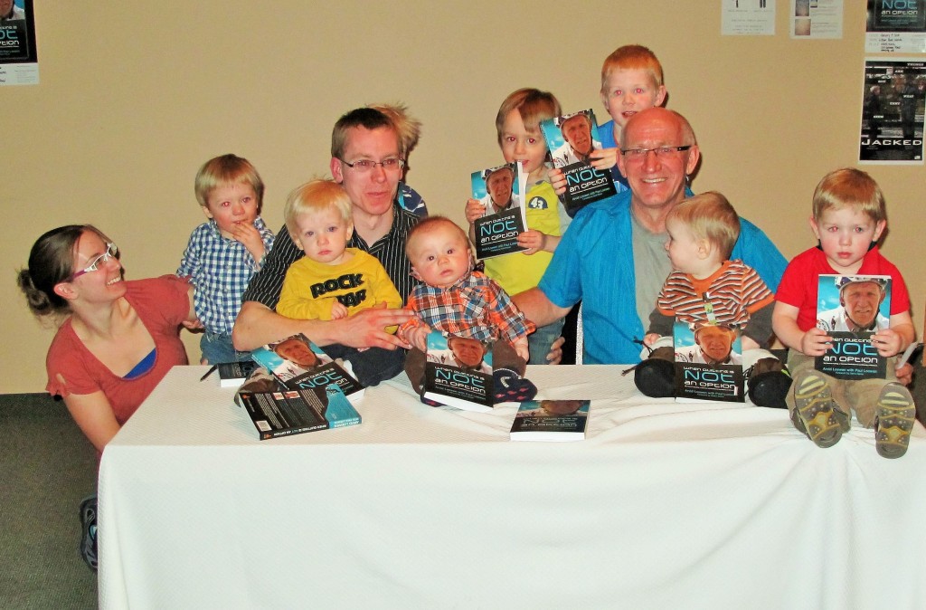 "Grandpas Can" Arvid Loewen, biographer and son Paul Loewen, and the 8 grandchildren