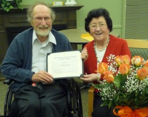 Harry and Gertrude Loewen receive the MHSC Award of Excellence.