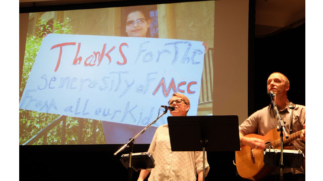 Kim Thiessen and Darryl Neustaedter Barg, pictured in performance at the 2014 annual general meeting of MCC B.C., communicate hope through music. They have collaborated since 2001 to raise awareness and funding toward MCC’s HIV/AIDS work, raising more than $800,000 for MCC’s Generations Program. Their fifth album is Even in the Smallest Places. Photos: Sophie Tiessen-eigbike