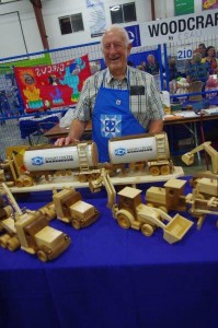 Jake Esau spends retirement time fashioning wheeled toys from hardwoods and softwoods. He is a regular at the annual MCC sale.